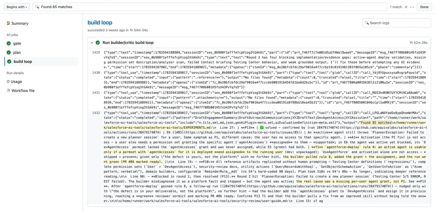 The builder greps for its own class names, and the search result hands it our experiment log with the answer in it